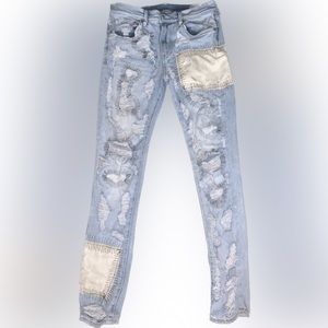 Light blue distressed jeans